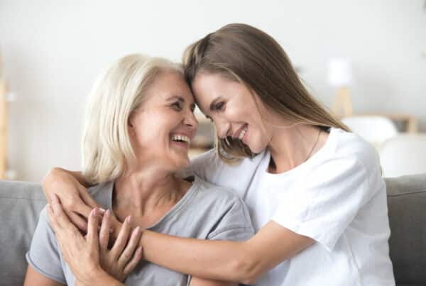 mother and daughter planning for assisted living together