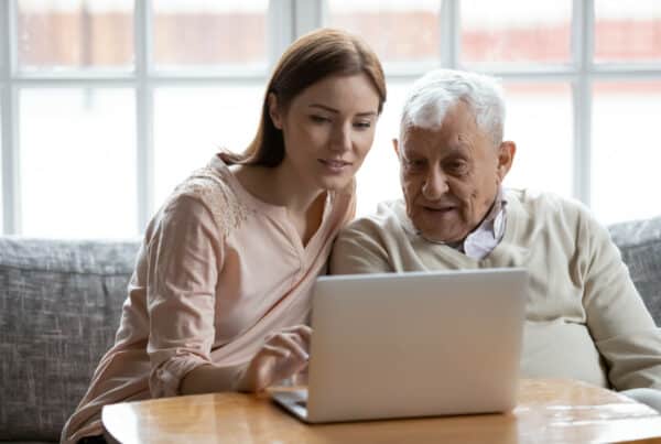 Woman with senior dad